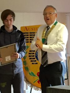 Adam receiving his Regional Young Achievers award from the Club's Chairman Mel Hill